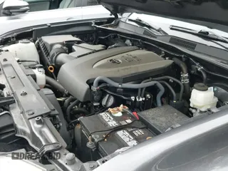 2020 Toyota Tacoma SR5 with VIN 5TFCZ5AN2LX231424, listed as a IAAI auction lot 41537128 with 37,236 mi miles and . Bid and sale history available at DreamBid. Image 19.