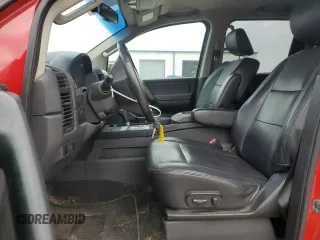 2012 Nissan Titan SV with VIN 1N6BA0EK4CN319941, listed as a Copart auction lot 43640705 with 210,885 mi miles and Salvage Title. Bid and sale history available at DreamBid. Image 7.