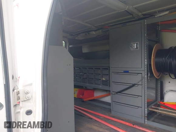 2011 Ford Econoline Cargo Commercial with VIN 1FTNE2ELXBDA18412, listed as a IAAI auction lot 42328684 with 115,484 mi miles and . Bid and sale history available at DreamBid. Image 8.