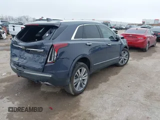 2024 Cadillac XT5 FWD Premium Luxury with VIN 1GYKNCR47RZ755652, listed as a IAAI auction lot 41512069 with 10,243 mi miles. Bid and sale history available at carsss.com. Image 4.