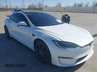 2022 Tesla Model S Plaid with VIN 5YJSA1E69NF486471, listed as a IAAI auction lot 41228818 with 49,207 mi miles and . Bid and sale history available at carsss.com. Image 1.
