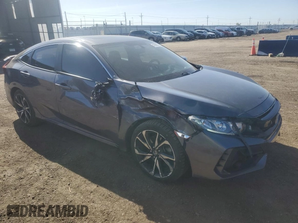 2018 Honda Civic Si with VIN 2HGFC1E57JH704397, listed as a Copart auction lot 51868535 with 44,620 mi miles and Salvage Title. Bid and sale history available at DreamBid. Image 4.