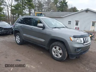 2012 Jeep Grand Cherokee Laredo with VIN 1C4RJFAG0CC270545, listed as a IAAI auction lot 41940781 with 200,529 mi miles. Bid and sale history available at carsss.com. Image 1.
