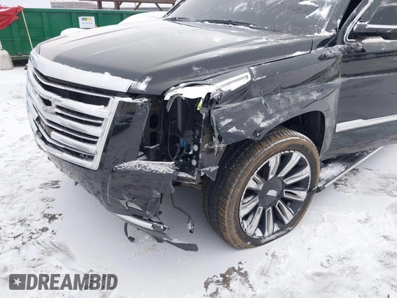 2015 Cadillac Escalade ESV Platinum z VIN 1GYS4UKJ0FR746571, wystawiony jako IAAI lot #38461309 z przebiegiem 65 724 mil mil oraz . Historia ofert i sprzedaży dostępna na DreamBid. Obrazek 6.