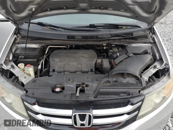 2014 Honda Odyssey Touring with VIN 5FNRL5H90EB096137, listed as a Copart auction lot 47192275 with 164,620 mi miles and Salvage Title. Bid and sale history available at DreamBid. Image 12.