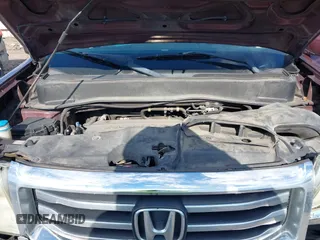 2013 Honda Pilot EX-L with VIN 5FNYF3H58DB032933, listed as a IAAI auction lot 42213061 with 166,496 mi miles and . Bid and sale history available at DreamBid. Image 10.