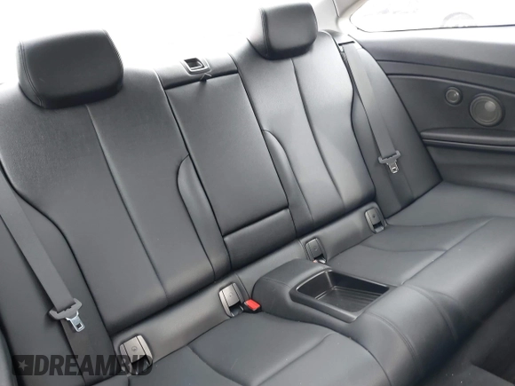 2014 BMW 4 Series 428i xDrive with VIN WBA3N9C50EK246002, listed as a IAAI auction lot 41612256 with 100,915 mi miles and . Bid and sale history available at carsss.com. Image 8.