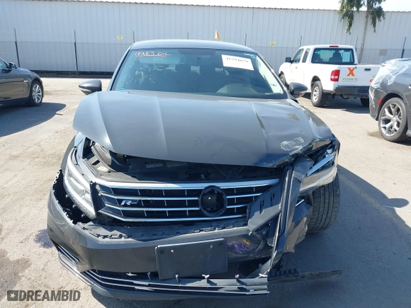 2018 Volkswagen Passat 2.0T S with VIN 1VWAA7A34JC025600, listed as a IAAI auction lot 41594079 with 92,019 mi miles. Bid and sale history available at carsss.com. Image 12.