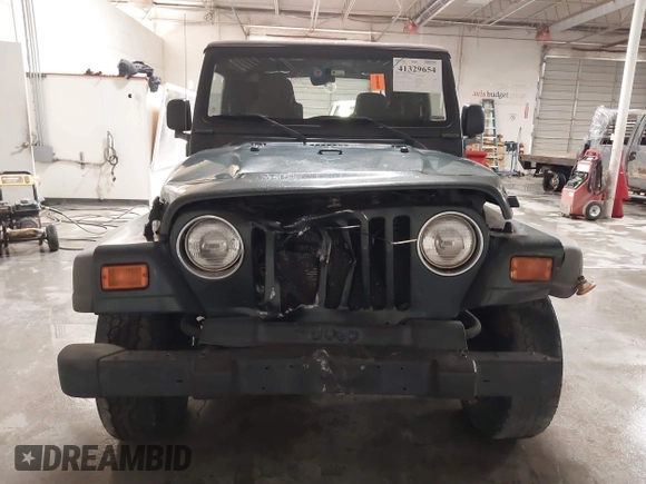 2003 Jeep Wrangler X z VIN 1J4FA39S43P339234, wystawiony jako IAAI lot #41329654 z przebiegiem 175 376 mil mil oraz . Historia ofert i sprzedaży dostępna na DreamBid. Obrazek 12.