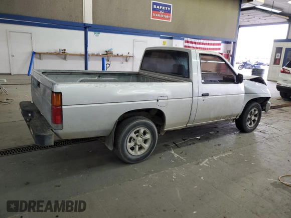 1987 Nissan Hardbody E z VIN JN6ND11S1HW006640, wystawiony jako Copart lot #78160004 z przebiegiem 403 406 mil mil oraz Szkoda całkowita • Salvage title. Historia ofert i sprzedaży dostępna na DreamBid. Obrazek 3.