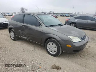 2007 Ford Focus S with VIN 1FAFP31N87W226088, listed as a Copart auction lot 88584555 with 83,896 mi miles and Salvage Title. Bid and sale history available at DreamBid. Image 4.