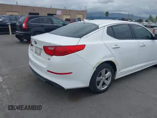 2015 Kia Optima LX with VIN KNAGM4A74F5662579, listed as a IAAI auction lot 42127251 with 144,138 mi miles and . Bid and sale history available at carsss.com. Image 6.