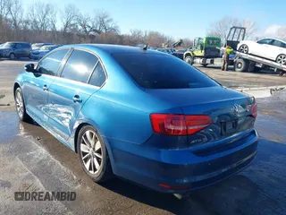 2015 Volkswagen Jetta SE with VIN 3VWD07AJ2FM257987, listed as a IAAI auction lot 41009826 with 112,213 mi miles and . Bid and sale history available at DreamBid. Image 3.