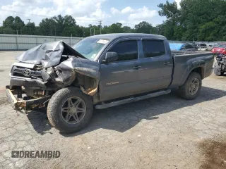 2014 Toyota Tacoma с VIN 5TFMU4FN3EX025697, выставлен на аукционе Copart как лот 62146895 с пробегом 133 028 миль миль и Списание • Salvage title. История ставок и продаж доступна на DreamBid. Изображение 1.