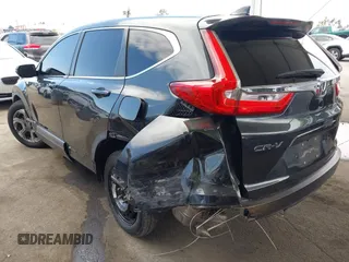 2019 Honda CR-V EX with VIN 5J6RW1H53KA031097, listed as a IAAI auction lot 42009187 with 115,701 mi miles. Bid and sale history available at carsss.com. Image 3.