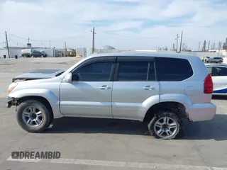 2007 Lexus GX 470 z VIN JTJBT20X970126650, wystawiony jako IAAI lot #42053295 z przebiegiem 235 740 mil mil oraz . Historia ofert i sprzedaży dostępna na DreamBid. Obrazek 14.