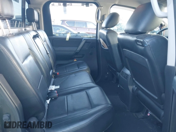 2010 Nissan Titan with VIN 1N6BA0FC1AN320629, listed as a IAAI auction lot 42491569 with 169,819 mi miles and . Bid and sale history available at DreamBid. Image 8.