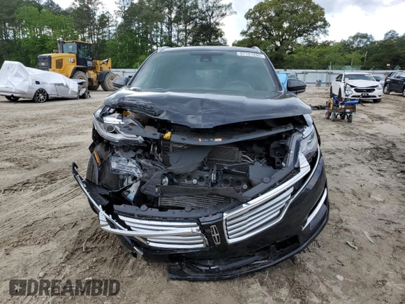 2018 Lincoln MKC Reserve z VIN 5LMTJ3DH7JUL33049, wystawiony jako Copart lot #57151205 z przebiegiem 39 594 mil mil oraz Szkody całkowita. Historia ofert i sprzedaży dostępna na DreamBid. Obrazek 5.