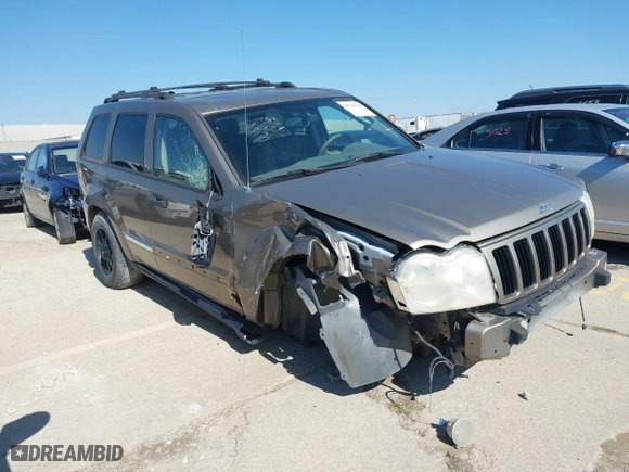 2005 Jeep Grand Cherokee Laredo with VIN 1J4HR48N35C647637, listed as a IAAI auction lot 38514345 with 167,342 mi miles. Bid and sale history available at carsss.com. Image 1.