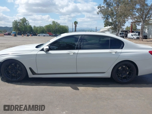 2017 BMW 7 Series 750i with VIN WBA7F0C32HGM22273, listed as a IAAI auction lot 41857151 with 90,518 mi miles and . Bid and sale history available at carsss.com. Image 14.