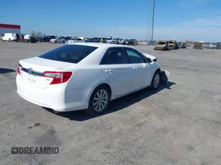 2012 Toyota Camry SE with VIN 4T1BK1FK1CU509931, listed as a IAAI auction lot 41474984 with 86,707 mi miles. Bid and sale history available at carsss.com. Image 4.