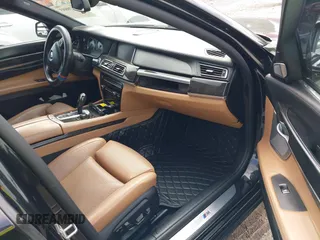 2013 BMW 7 Series 750Li z VIN WBAYE8C59DD133605, wystawiony jako IAAI lot #42179893 z przebiegiem 73 065 mil mil oraz . Historia ofert i sprzedaży dostępna na DreamBid. Obrazek 5.