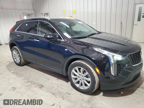 2021 Cadillac XT4 AWD Luxury with VIN 1GYFZBR42MF055788, listed as a Copart auction lot 46704275 with 23,516 mi miles and Clean Title. Bid and sale history available at carsss.com. Image 4.