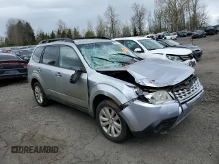 2012 Subaru Forester X Premium with VIN JF2SHADC2CH407983, listed as a Copart auction lot 51628125 with 147,271 mi miles and Salvage Title. Bid and sale history available at DreamBid. Image 4.