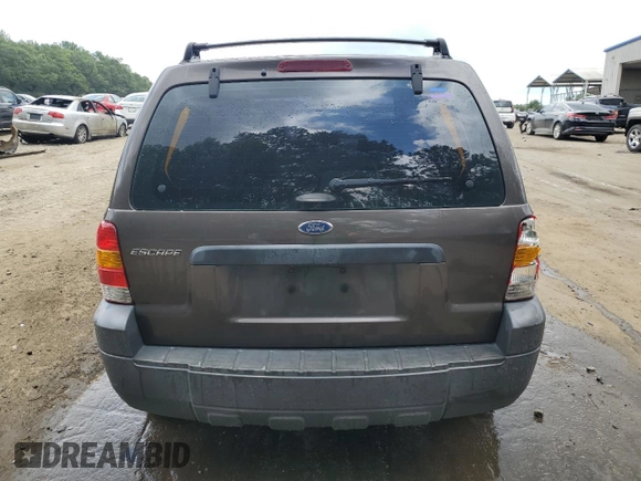 2006 Ford Escape XLS with VIN 1FMYU02Z56KD47674, listed as a Copart auction lot 60668134 with 248,535 mi miles and Salvage Title. Bid and sale history available at carsss.com. Image 6.