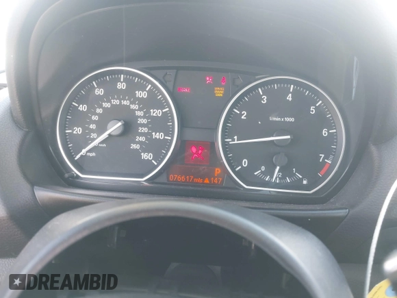 2011 BMW 1 Series 128i with VIN WBAUL7C54BVM80474, listed as a IAAI auction lot 42031032 with 76,617 mi miles and . Bid and sale history available at carsss.com. Image 7.