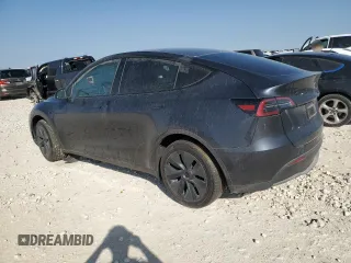 2025 Tesla Model Y Long Range z VIN 7SAYGDEE8SA338745, wystawiony jako Copart lot #50034495 z przebiegiem 4 829 mil mil oraz Szkoda całkowita • Salvage title. Historia ofert i sprzedaży dostępna na DreamBid. Obrazek 2.