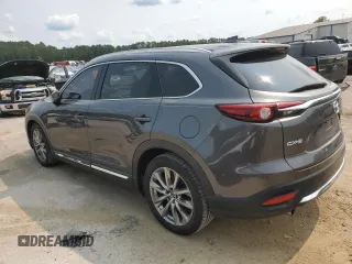 2017 Mazda CX-9 Grand Touring z VIN JM3TCADYXH0138805, wystawiony jako Copart lot #59201915 z przebiegiem 147 896 mil mil oraz Czysty tytuł • Clean title. Historia ofert i sprzedaży dostępna na DreamBid. Obrazek 2.
