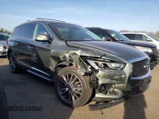 2017 Infiniti QX60 with VIN 5N1DL0MM6HC513197, listed as a Copart auction lot 48238615 with 101,015 mi miles and Salvage Title. Bid and sale history available at DreamBid. Image 4.