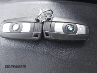 2010 BMW 1 Series 135i with VIN WBAUN9C54AVK41785, listed as a IAAI auction lot 41228825 with 60,817 mi miles and . Bid and sale history available at carsss.com. Image 11.