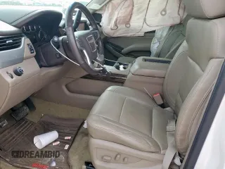 2016 GMC Yukon XL SLT z VIN 1GKS1GKC1GR252081, wystawiony jako Copart lot #53354975 z przebiegiem 200 621 mil mil oraz Szkoda całkowita • Salvage title. Historia ofert i sprzedaży dostępna na DreamBid. Obrazek 7.