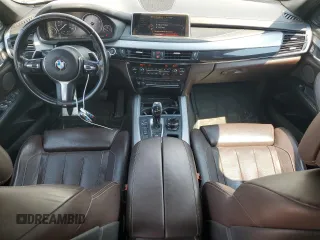 2014 BMW X5 xDrive50i z VIN 5UXKR6C54E0J71803, wystawiony jako Copart lot #60000295 z przebiegiem 130 769 mil mil oraz Czysty tytuł • Clean title. Historia ofert i sprzedaży dostępna na DreamBid. Obrazek 8.