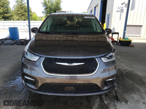 2023 Chrysler Pacifica Touring L with VIN 2C4RC1BG1PR581376, listed as a Copart auction lot 59901915 with 57,411 mi miles and Salvage title. Bid and sale history available at DreamBid. Image 5.