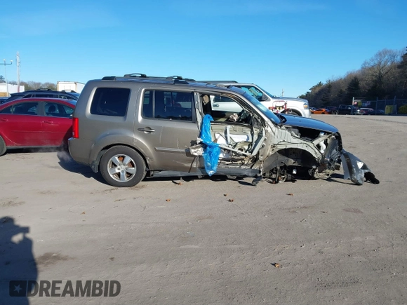 2011 Honda Pilot EX-L with VIN 5FNYF3H64BB030389, listed as a IAAI auction lot 41514251 with 100,666 mi miles and . Bid and sale history available at DreamBid. Image 14.