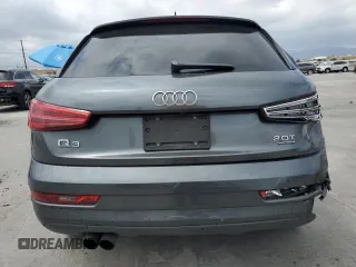 2018 Audi Q3 Premium with VIN WA1ECCFS8JR002738, listed as a Copart auction lot 53276095 with 171,912 mi miles and Salvage title. Bid and sale history available at DreamBid. Image 6.