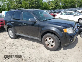 2011 Ford Escape XLT with VIN 1FMCU9DGXBKA90337, listed as a Copart auction lot 56063355 with 122,956 mi miles and Non repairable. Bid and sale history available at DreamBid. Image 4.