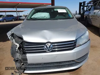 2015 Volkswagen Passat 1.8T Wolfsburg Ed with VIN 1VWAT7A31FC028990, listed as a IAAI auction lot 41778229 with 73,553 mi miles. Bid and sale history available at carsss.com. Image 12.