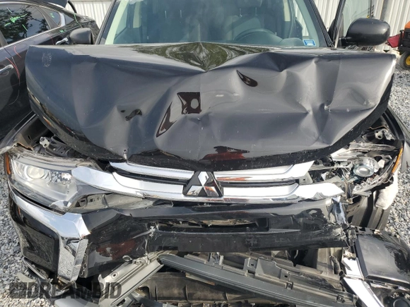 2018 Mitsubishi Outlander ES with VIN JA4AD2A34JZ006680, listed as a Copart auction lot 59897555 with 56,709 mi miles and Salvage title. Bid and sale history available at DreamBid. Image 12.