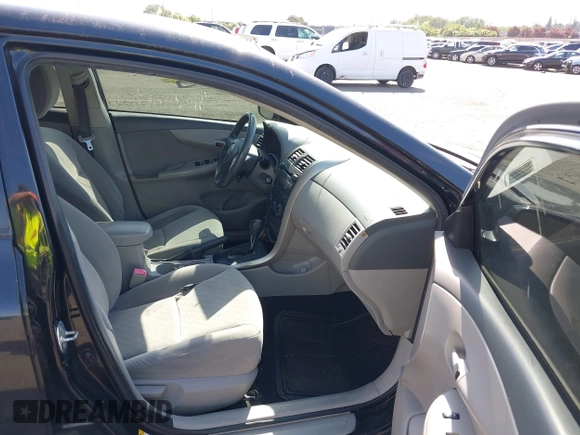 2009 Toyota Corolla with VIN JTDBL40E899046607, listed as a IAAI auction lot 42141452 with 204,769 mi miles. Bid and sale history available at carsss.com. Image 5.