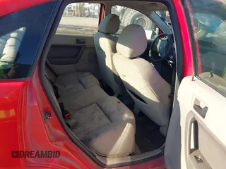 2008 Ford Focus SE with VIN 1FAHP35N18W272267, listed as a IAAI auction lot 41003854 with 239,062 mi miles. Bid and sale history available at carsss.com. Image 8.