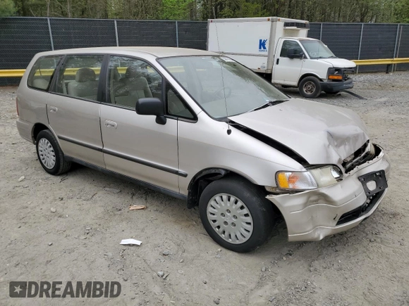 1996 Honda Odyssey with VIN JHMRA184XTC004544, listed as a Copart auction lot 53875355 with 165,945 mi miles and Salvage title. Bid and sale history available at DreamBid. Image 4.