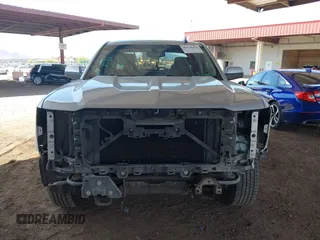 2016 Chevrolet Silverado 1500 LT with VIN 1GCRCREC3GZ185219, listed as a IAAI auction lot 41970474 with 124,101 mi miles and . Bid and sale history available at DreamBid. Image 6.