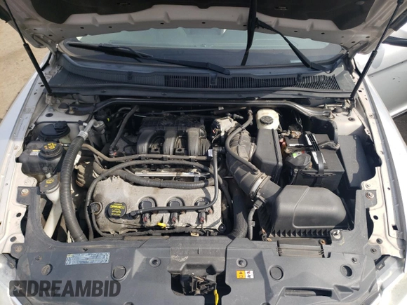 2012 Ford Taurus SEL z VIN 1FAHP2HW4CG129105, wystawiony jako Copart lot #54708445 z przebiegiem 201 450 mil mil oraz Szkoda całkowita • Salvage title. Historia ofert i sprzedaży dostępna na DreamBid. Obrazek 11.