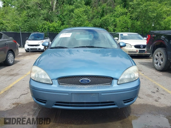 2007 Ford Taurus SEL with VIN 1FAFP56U47A178470, listed as a IAAI auction lot 42286192 with 111,553 mi miles and . Bid and sale history available at DreamBid. Image 13.
