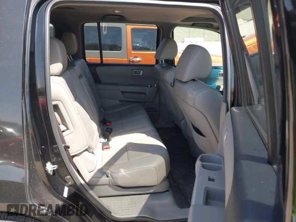 2012 Honda Pilot EX-L with VIN 5FNYF4H52CB085308, listed as a IAAI auction lot 41987301 with 180,877 mi miles and . Bid and sale history available at DreamBid. Image 8.