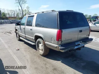 1999 GMC Suburban with VIN 3GKFK16R4XG514928, listed as a IAAI auction lot 41934636 with 245,010 mi miles and . Bid and sale history available at DreamBid. Image 3.